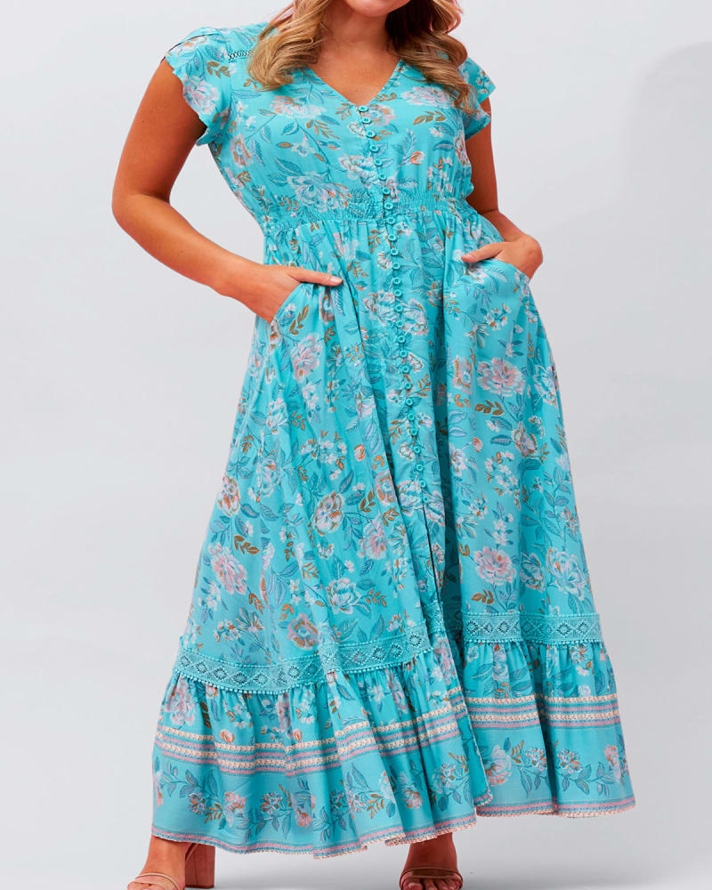 Front of a model wearing a size 1X Larissa Maxi Dress Floral Print Front Slit Blue in Blue by ANNICK. | dia_product_style_image_id:352689